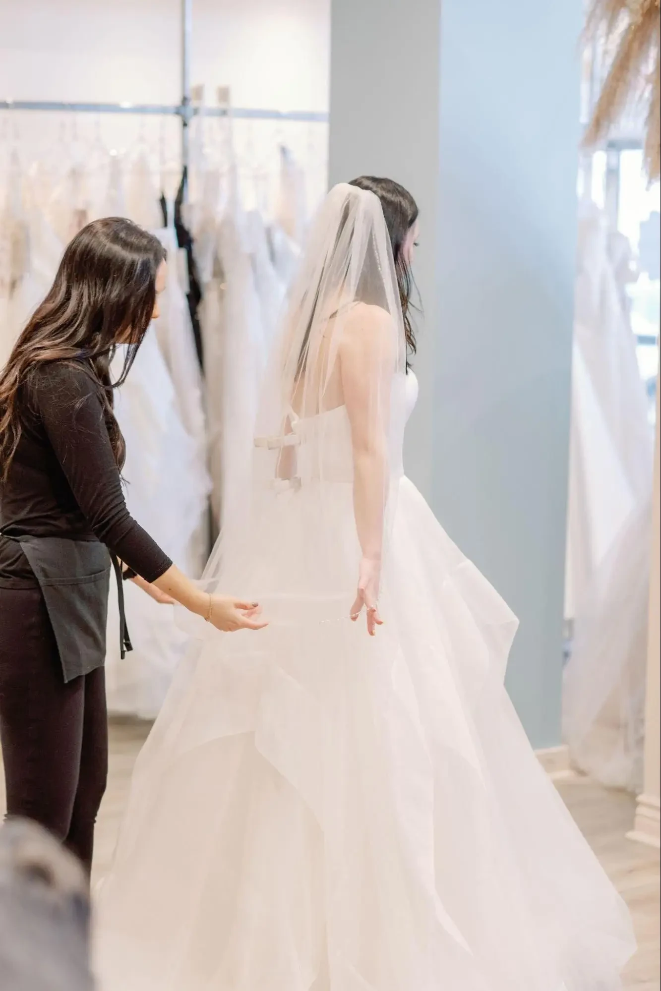 Belle Amour stylist assisting bride during her appointment