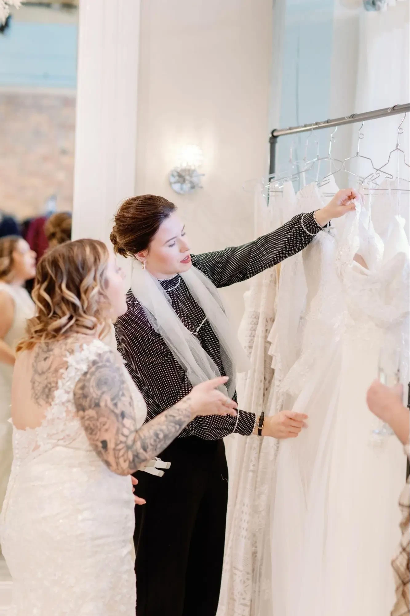 Belle Amour bridal stylist assisting bride during her appointment