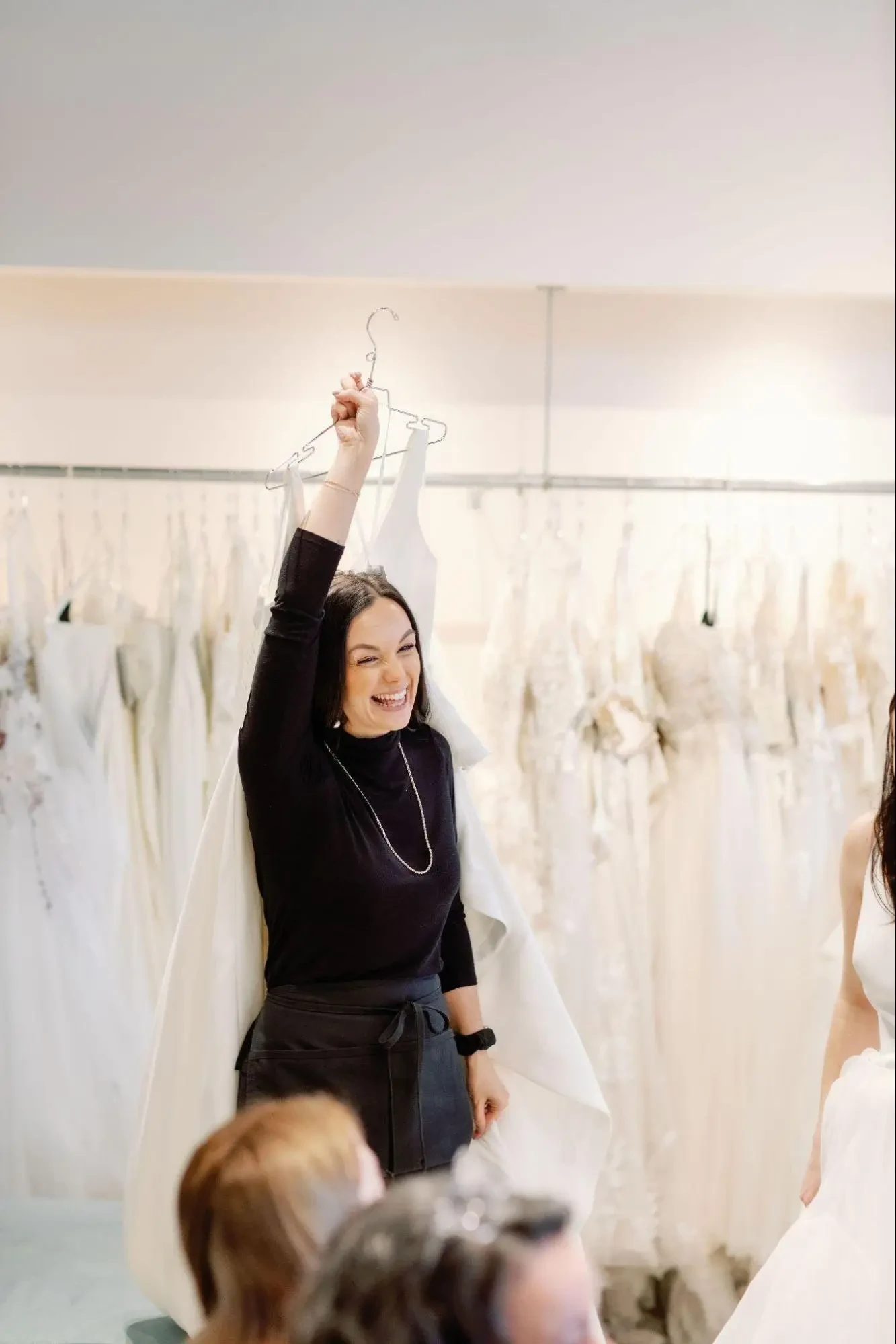 Belle Amour bridal stylist assisting bride during her appointment