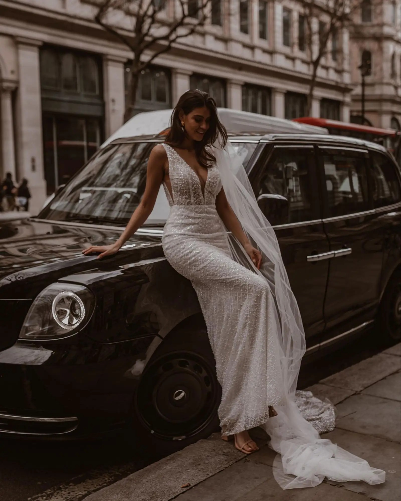 Model wearing Kendall wedding dress by Made With Love