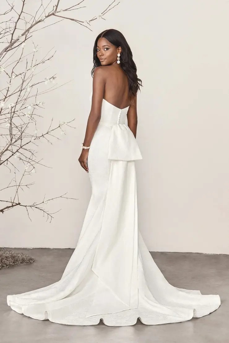 Model wearing a white gown