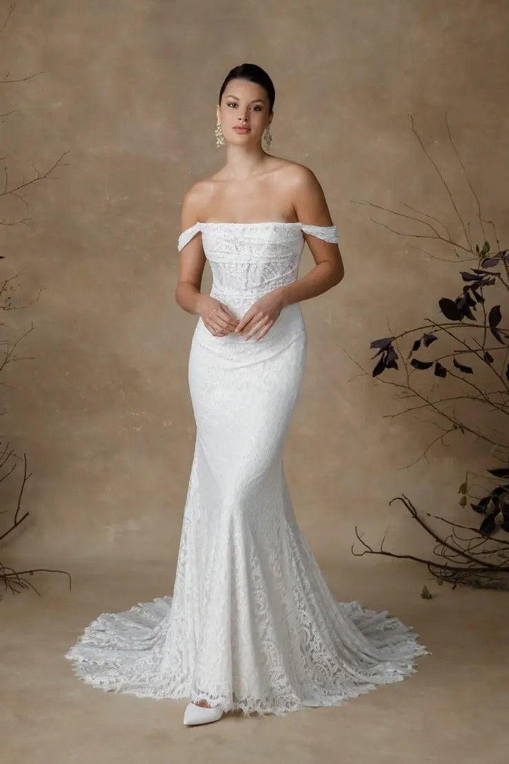 Model wearing a white gown