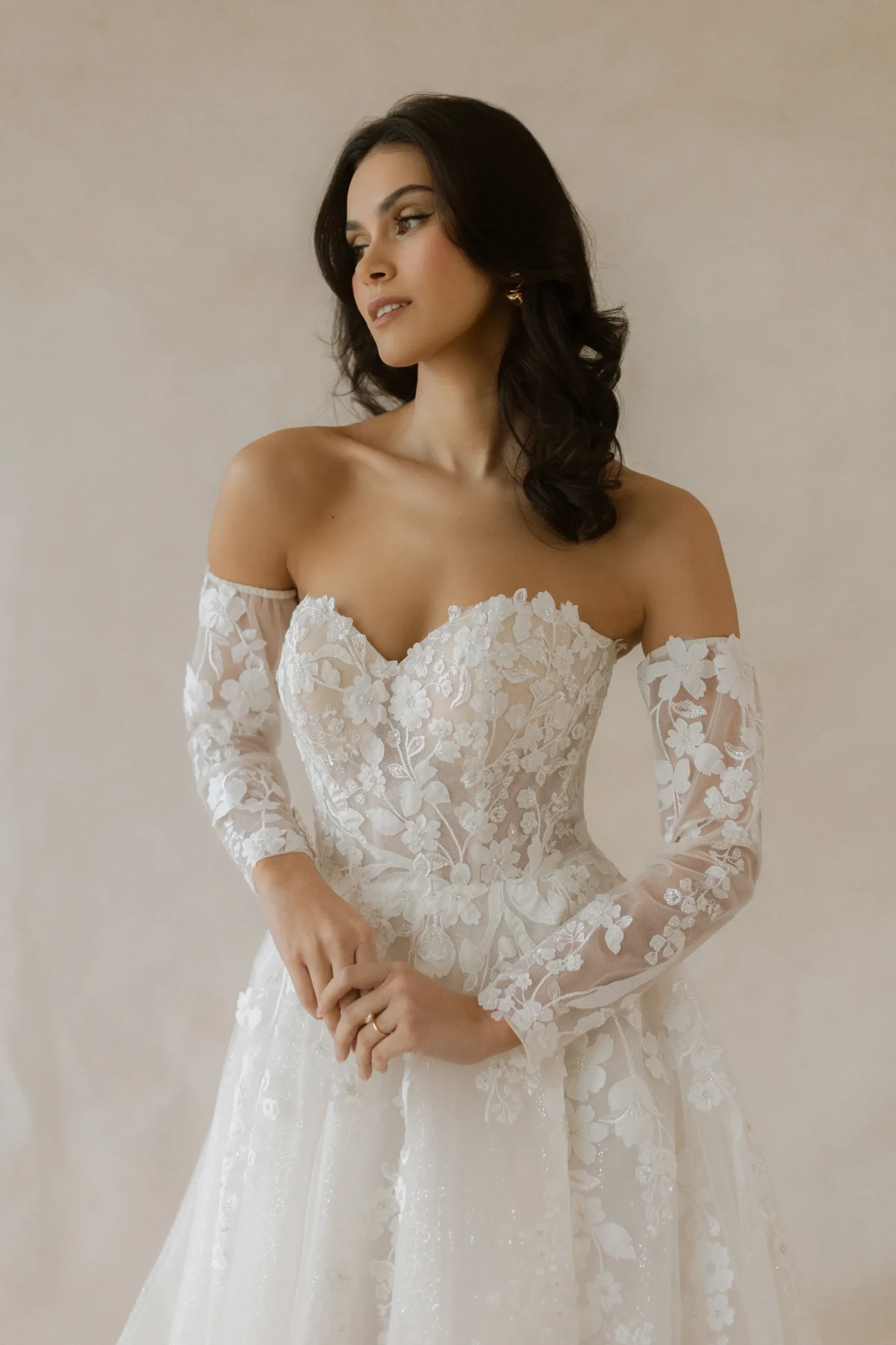 Model wearing a white gown
