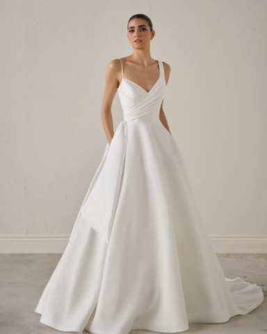 A beautiful bride in her gorgeous white mikado wedding gown