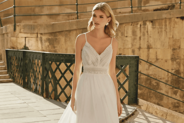 A woman in her elegant wedding gown in v-neckline