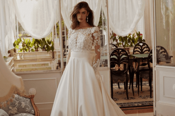 A lady in her elegant mikado ball gown with Bateau neckline