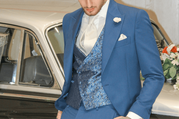 A man in a three piece wedding suit