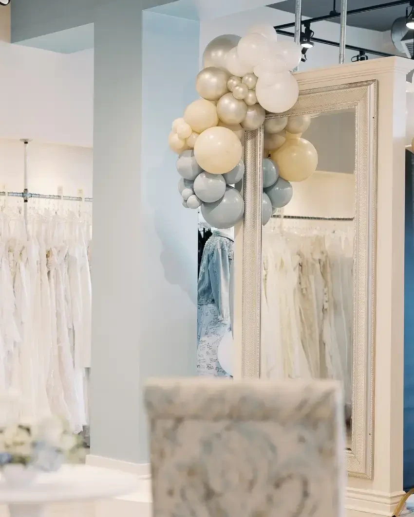 wedding dresses hanging at belle amour bridal