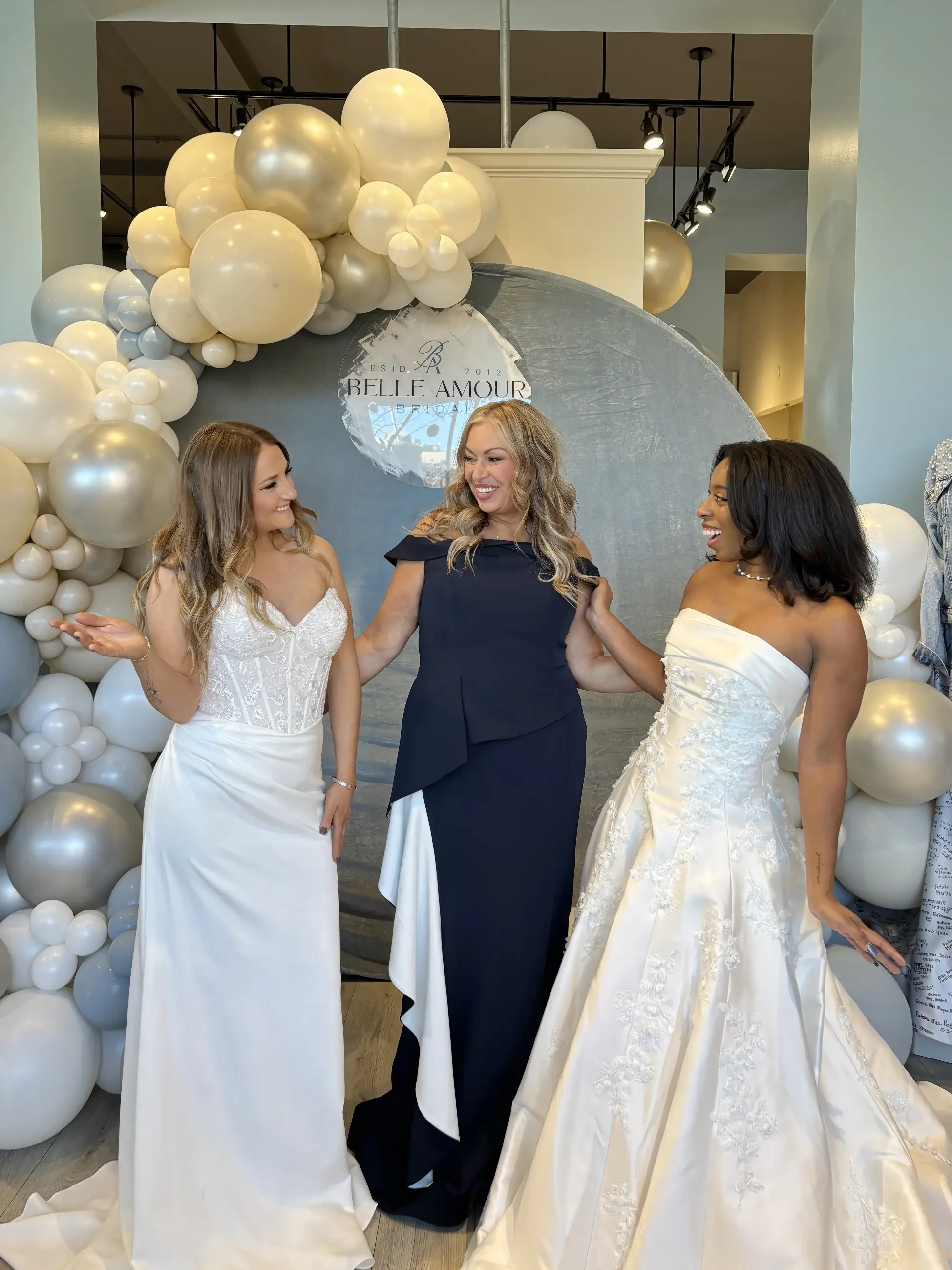 Bride trying on a gown at Belle Amour Bridal
