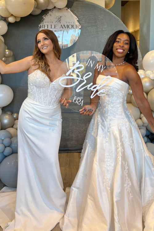 Two brides trying on gowns at belle amour bridal in south bend indiana